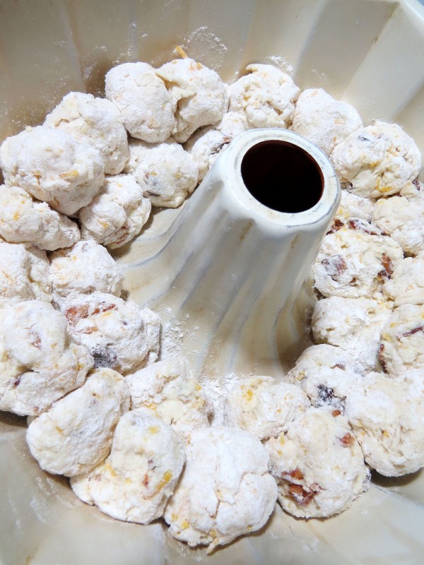 dough balls layerd in bundt pan