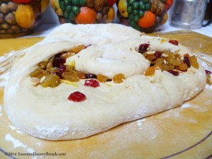 Kneading the fruit into the dough