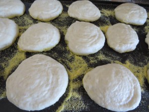 Dough on cornmeal griddle