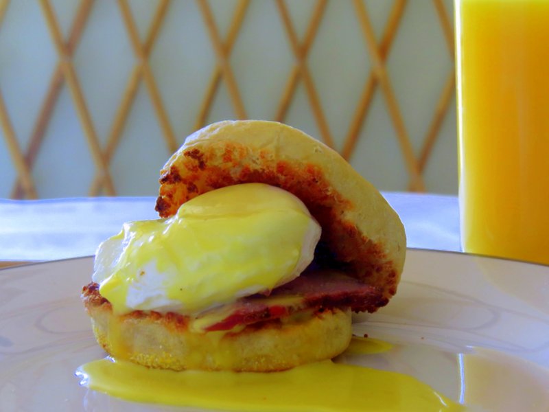 English Muffin Breakfast Sandwich with a poached egg tri-tip and hollandaise.